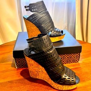 Black platforms with cork wedge heel. CHARLES by Charles David. 9M